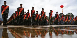 Përgatitja për luftë apo një pandemi të re? Kompanitë kineze po krijojnë ushtritë e tyre vullnetare si në vitet 1970