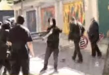 Tensione në protestën e studentëve, një grup i vogël personash të maskuar dëmton sinjalistikën dhe kangjellat